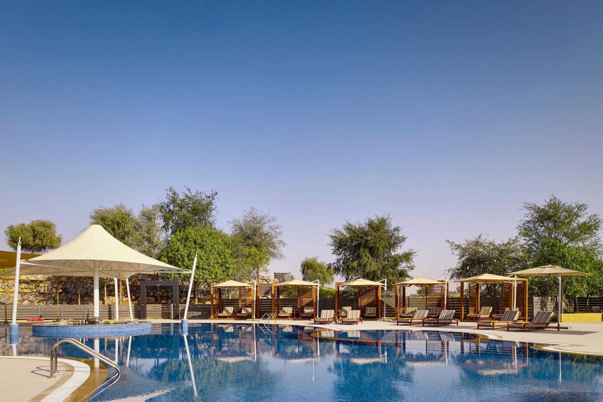 فندق ريتز كارلتون رأس الخيمة,صحراء الوادي المظهر الخارجي الصورة The swimming pool at the resort